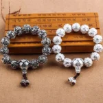 Om Mani Padme Hum 108 bead bracelet in silver and antique silver on bamboo calligraphy with carved mantra beads