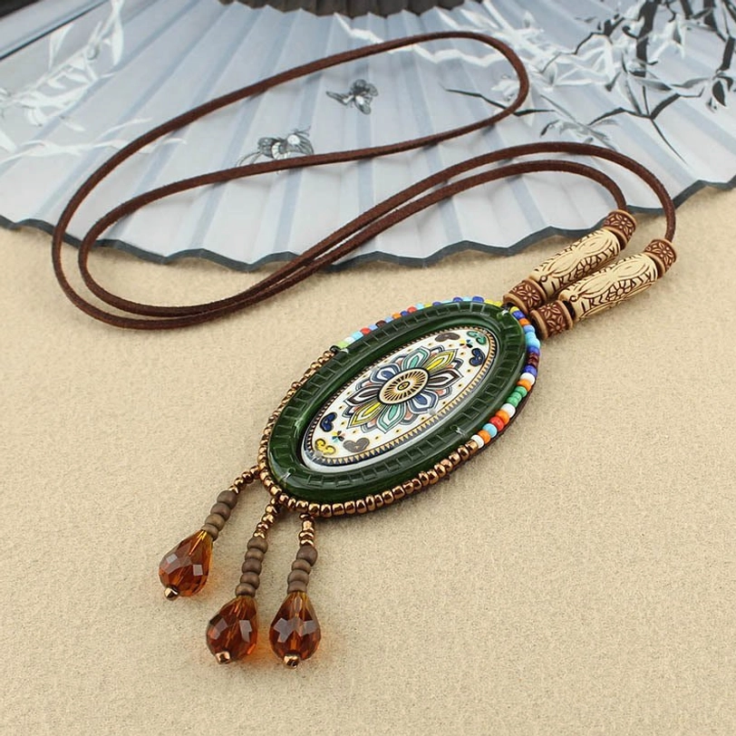 Oval Tibetan mandala beaded necklace pendant handcrafted with geometric patterns and protective symbolism