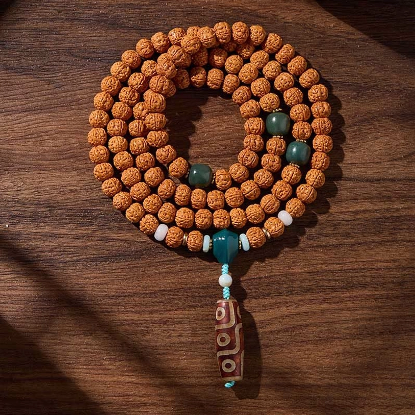 Peaceful years and good harvest dzi bead mala worn as prayer necklace, representing longevity and spiritual abundance
