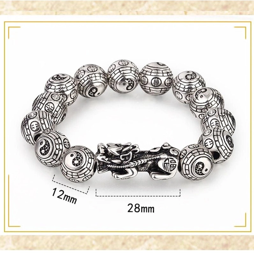 12mm Pixiu wealth bracelet with 28mm Pixiu charm - detailed view showing carved spherical beads