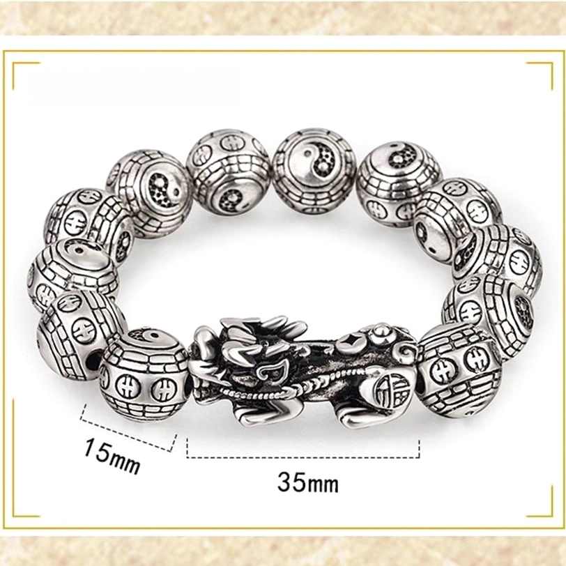 15mm Pixiu wealth bracelet with 35mm Pixiu charm - larger bead statement piece flat lay