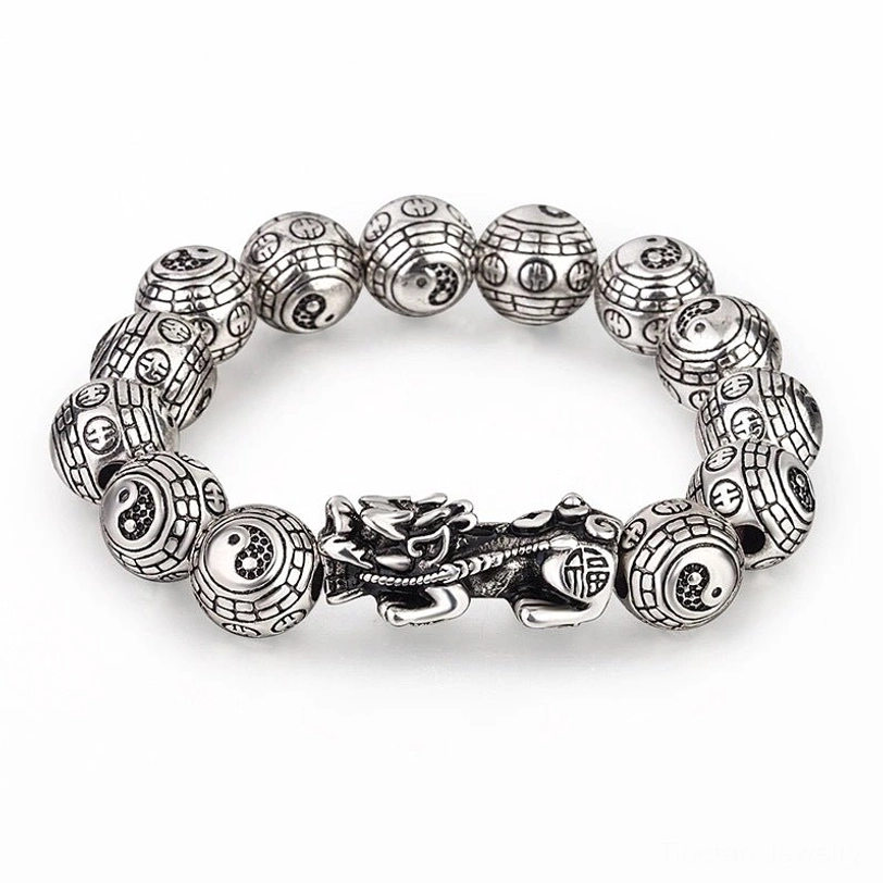 Silver Pixiu bracelet with carved beads and central protective charm - clean product display