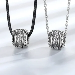 Pixiu rotating wealth necklace pendant with multiple chain options - flat lay front view showing intricate carved silver details