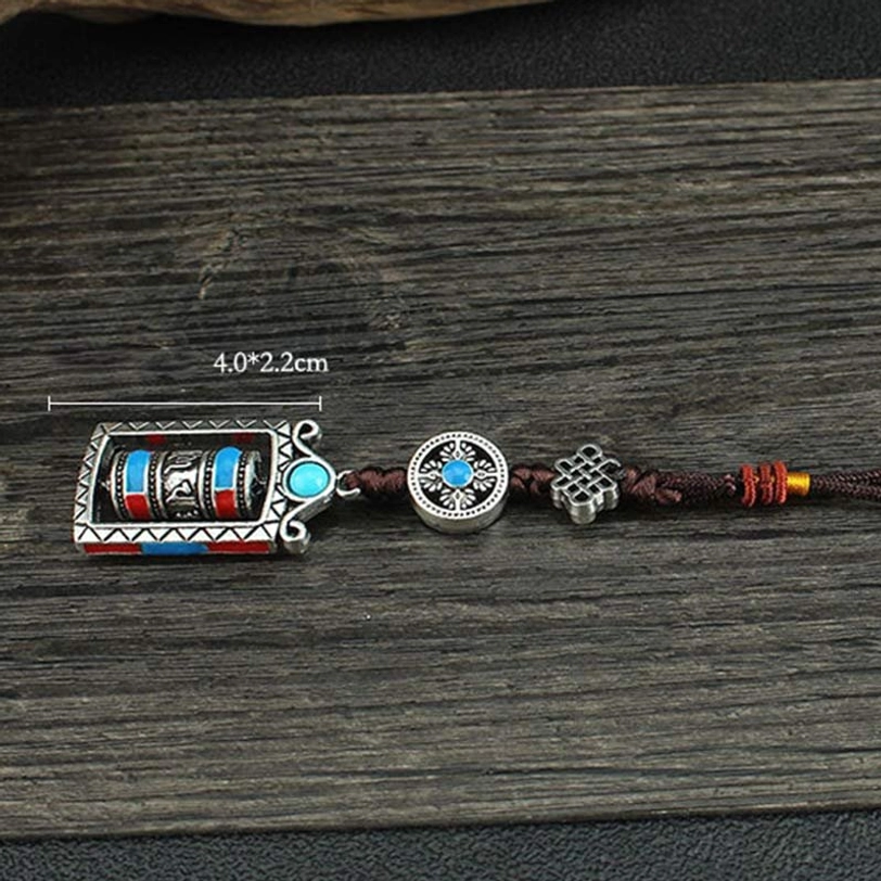 Tibetan Om Mani Padme Hum prayer wheel keychain scale reference, compact size for daily carry, portable spiritual talisman