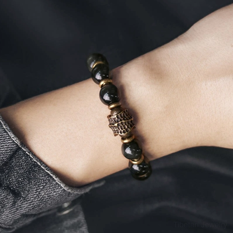 Rainbow obsidian copper healing bracelet product photography showing craftsmanship quality