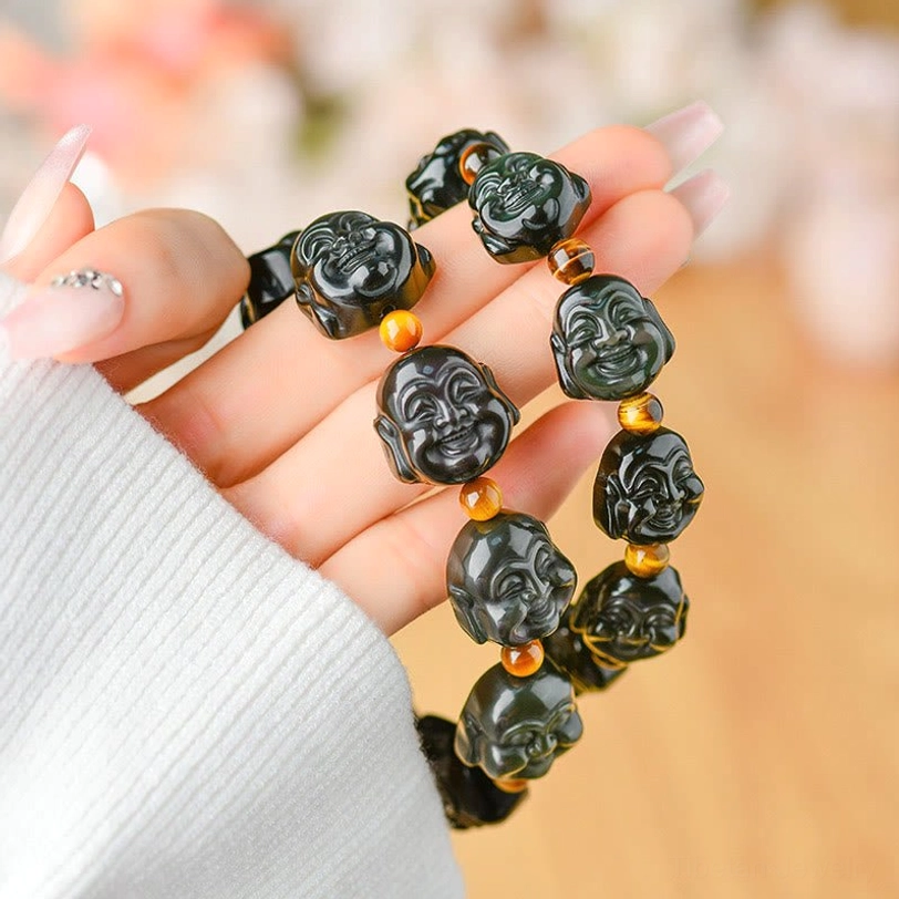 Rainbow obsidian laughing Buddha bracelet - handmade natural stone beads showing iridescent colors and carved Buddha design