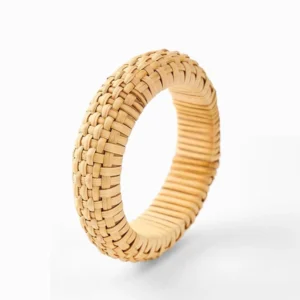 Hand-woven rattan grounding bracelet flat lay front view with checkerboard woven texture and natural tan color on white background