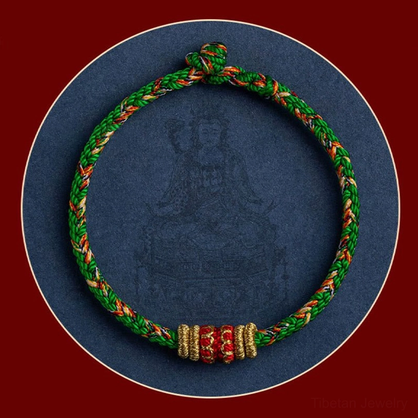 Red thread of fate zodiac bracelet symbolizing cosmic connection and destiny