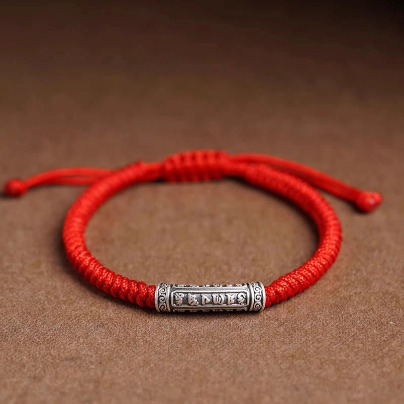 Red Tibetan Om Mani Padme Hum rope bracelet with adjustable closure, premium sterling silver engraved charm