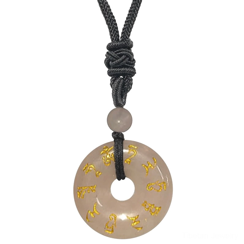 Rose Quartz Green Tara mantra pendant, matte light pink stone with golden Sanskrit engraving and black braided cord accent bead