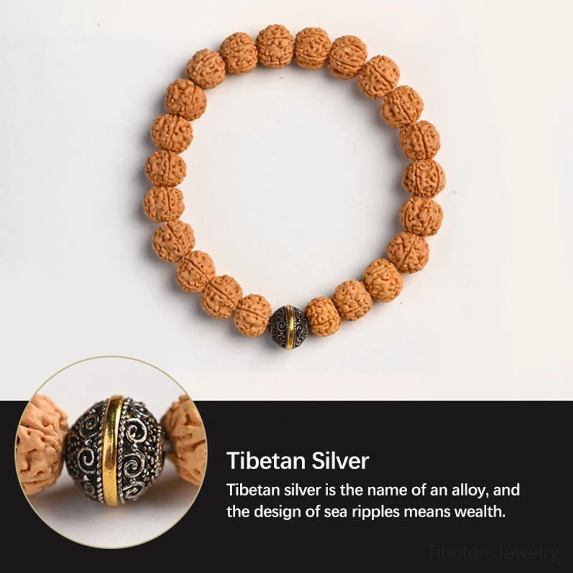 Rudraksha Bodhi seed bracelet featuring round sea ripple pattern Tibetan silver accent bead