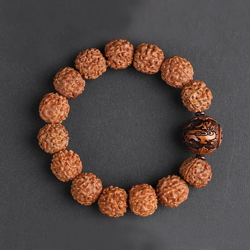 Rudraksha Pixiu bracelet laid flat on gray background, circular arrangement showcasing matte brown bead texture