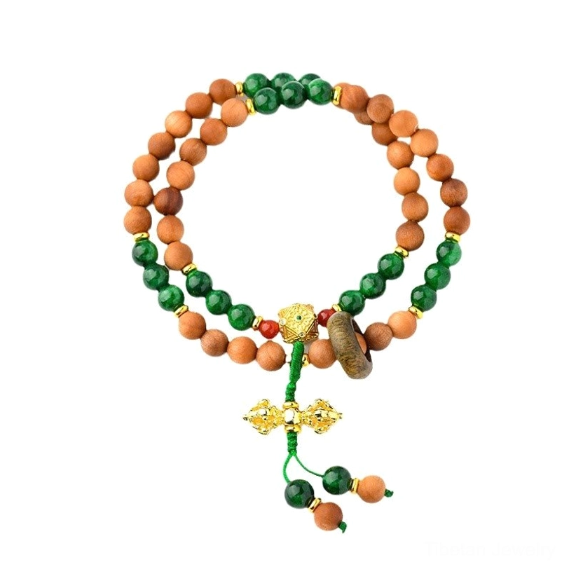 Complete sandalwood and green jade bead bracelet strand with gold vajra tassel accent