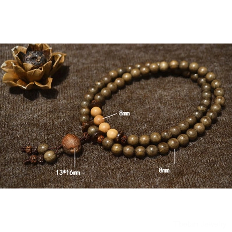 Sandalwood prayer bead mala bracelet displaying natural wood colors and traditional Tibetan craftsmanship