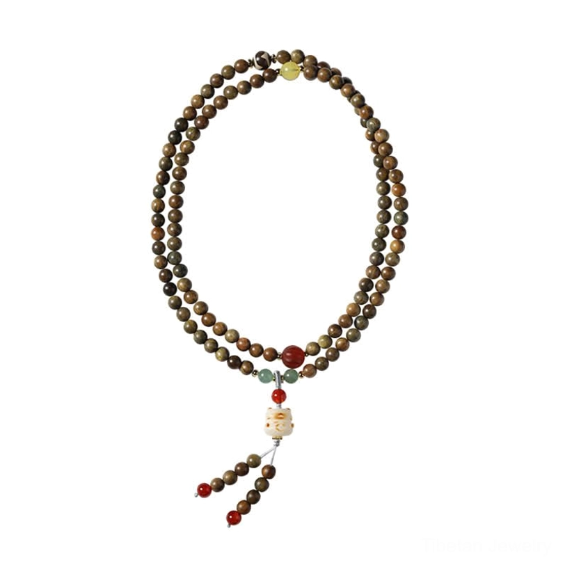 Multi-strand sandalwood mala bracelet with red accent beads and cat tassel charm displayed on white background