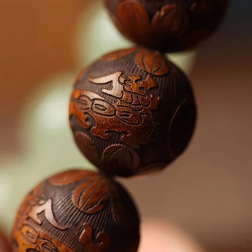 Extreme macro close-up texture of dark brown sappan wood beads with traditional carved patterns