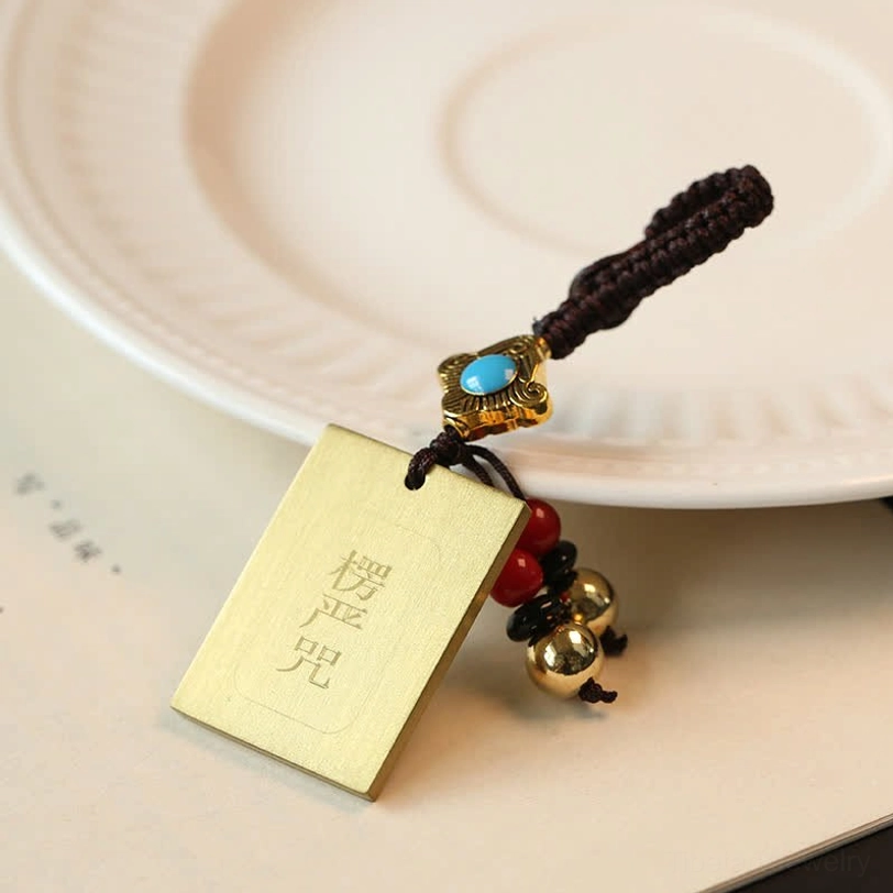 Shurangama Mantra brass tag keychain with engraved sacred Buddhist mantra text and bead tassel decoration
