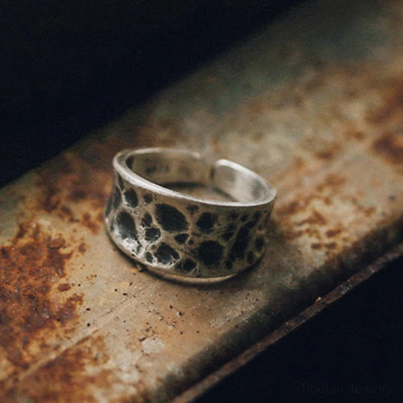 925 sterling silver wide band ring porous cracked texture front oblique view craftsmanship