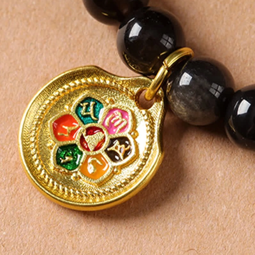 Silver Sheen Obsidian Garuda necklace natural stone variations artistic product photography