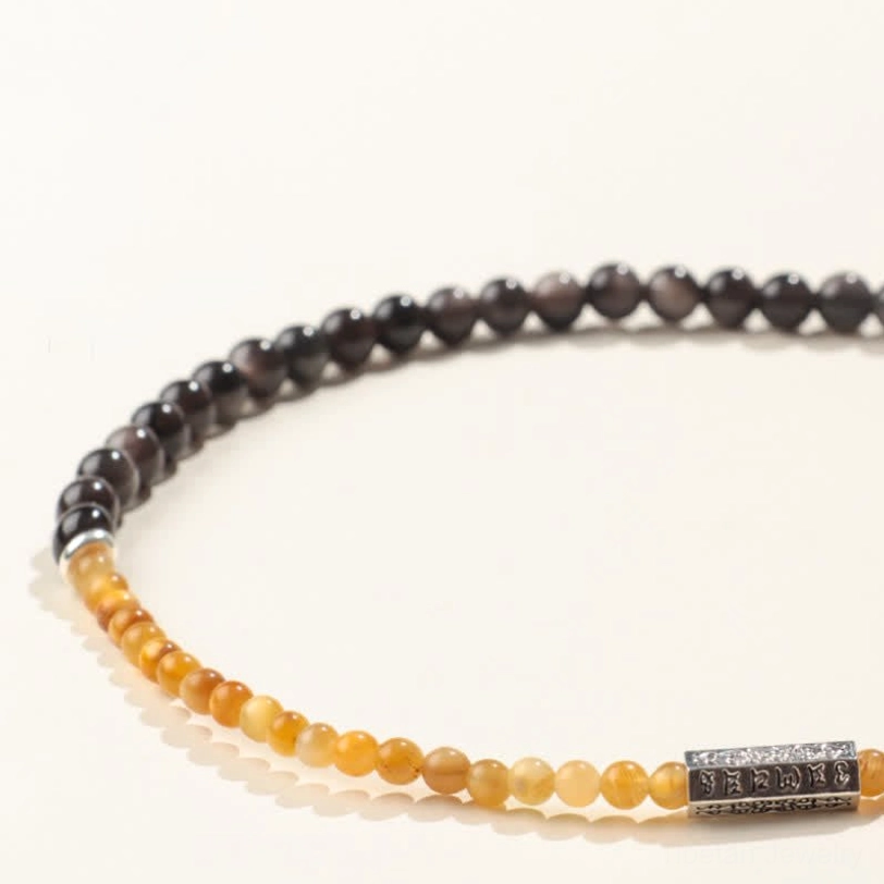 Single strand Silver Sheen Obsidian and golden-yellow stone bracelet with silver Om Mani Padme Hum charm ready to wrap twice