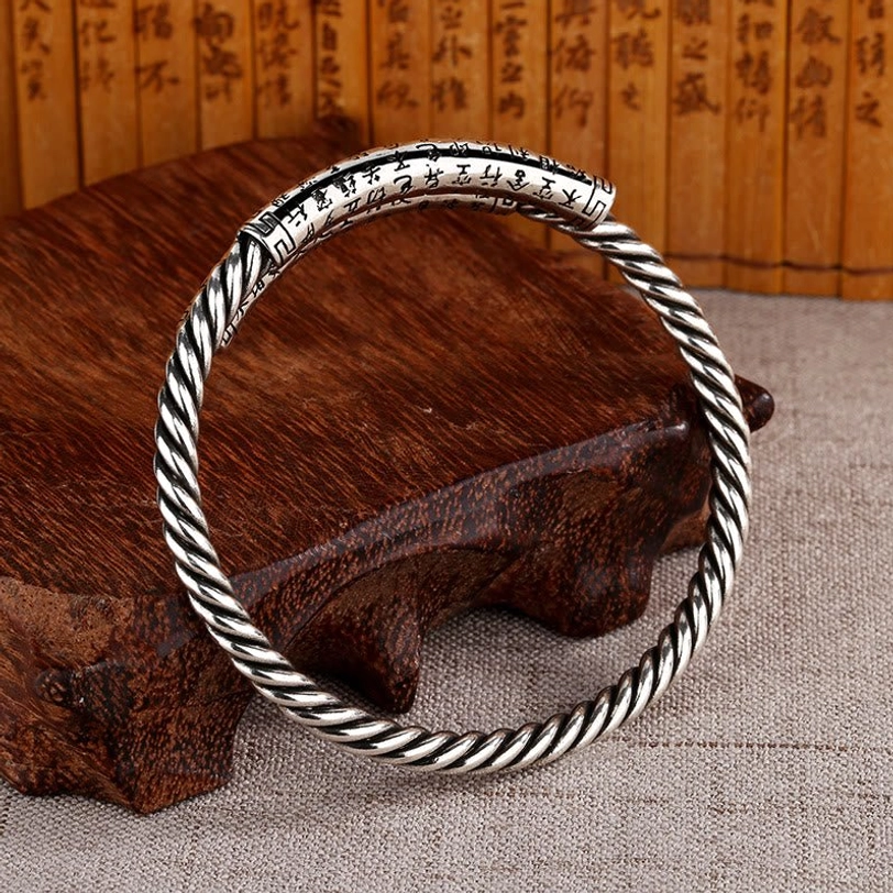 Single copper Heart Sutra adjustable bangle - side flat lay showing open cuff design with engraved sutra and twisted rope texture