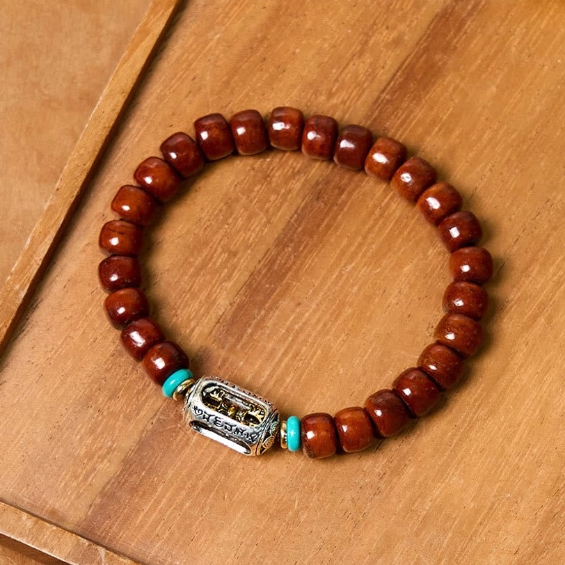 Spiritual Dzi bead mala bracelet with traditional Tibetan protection symbol