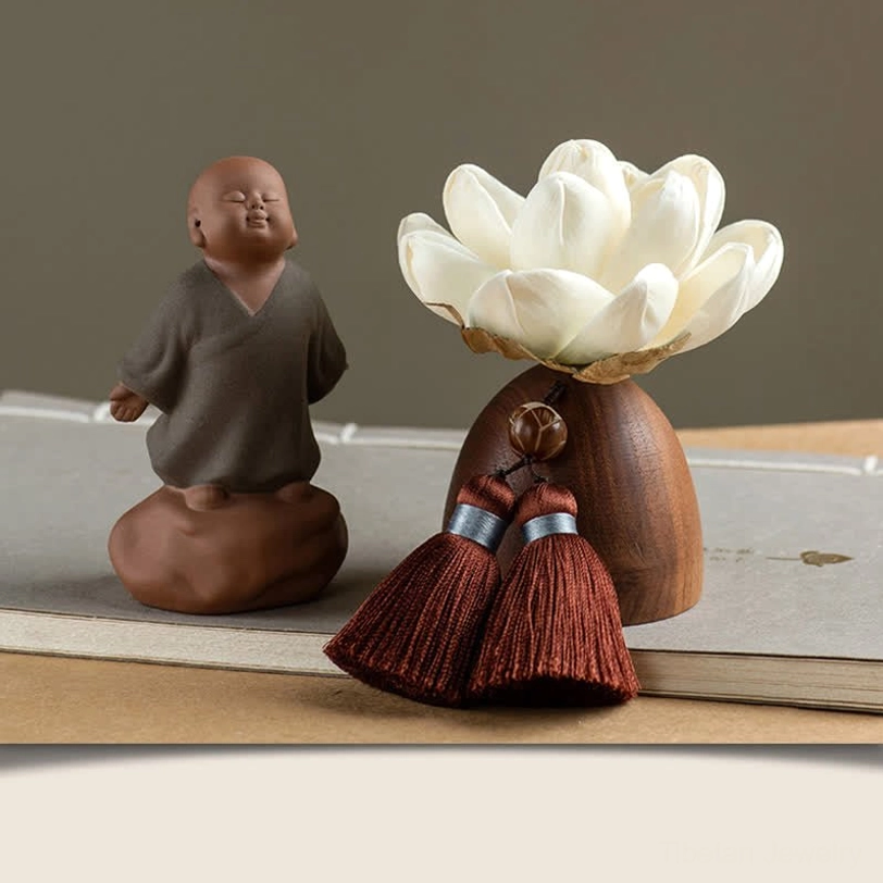 Standing little monk Buddha figurine in prayer pose with lotus holder and meditation decoration