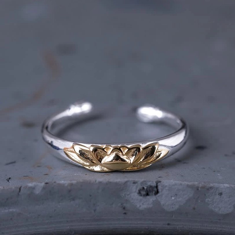 925 sterling silver lotus ring adjustable open cuff with gold embossed design front view on stone