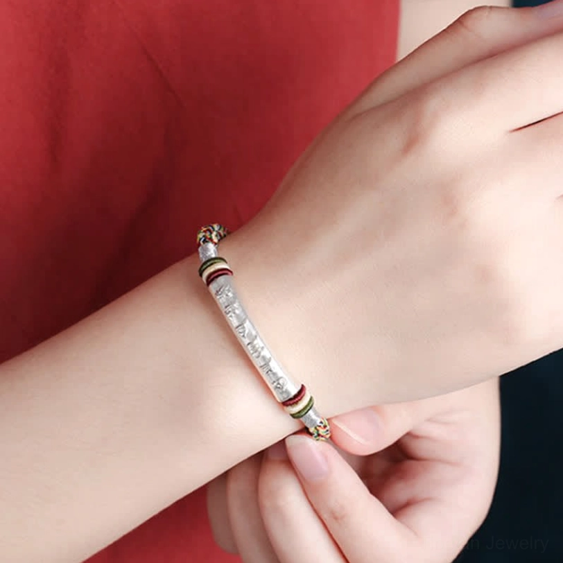 Pure 999 sterling silver Om Mani Padme Hum protection bracelet in blue with braided rope design