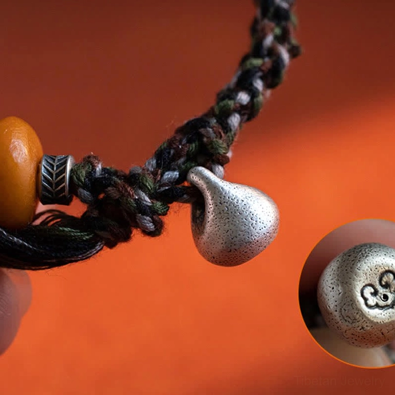 Sterling silver steelyard charm detail photograph showing intricate design and craftsmanship of the protection symbol