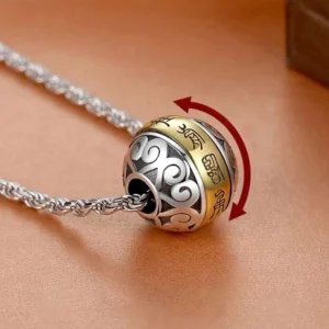 Taoist nine-character mantra copper amulet necklace with rotatable pendant and twisted silver chain, close-up side view