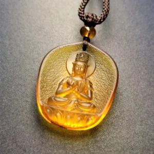 Goat or Monkey Tathagata Buddha Liuli crystal pendant necklace featuring meditating bodhisattva on lotus with brown woven cord