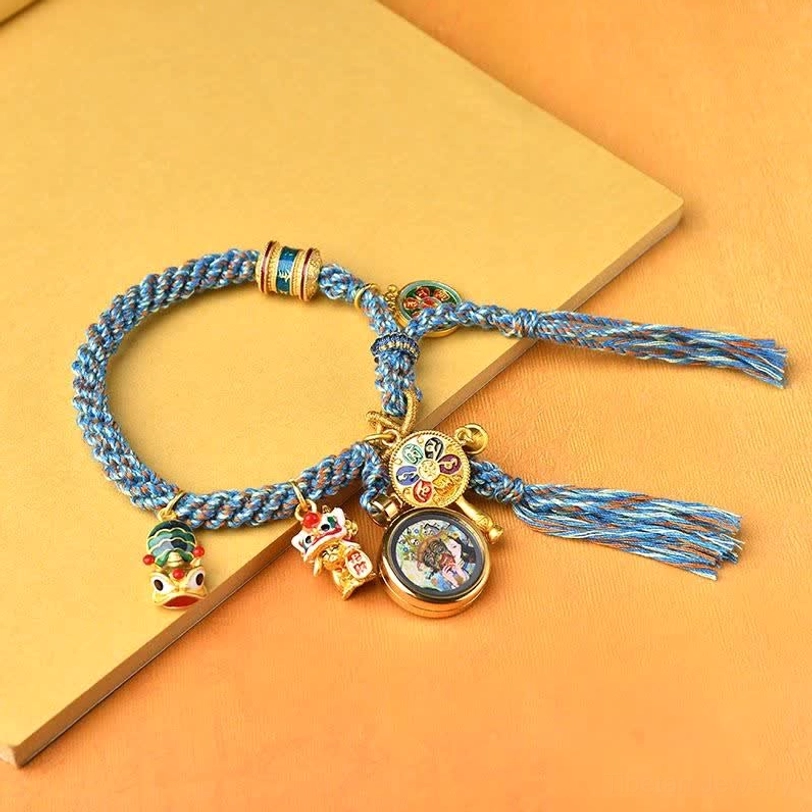 Zakiram thangka prayer wheel charm bracelet with blue-gray braided rope and tassel