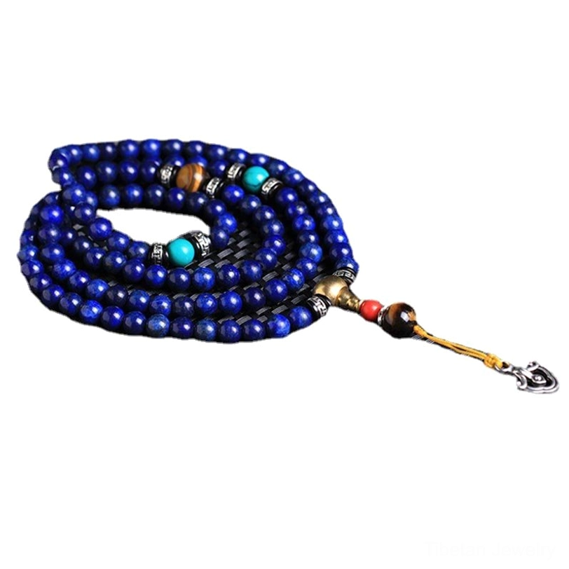Full 108-bead Lapis Lazuli mala coiled design with visible gemstone spacers and natural stone textures