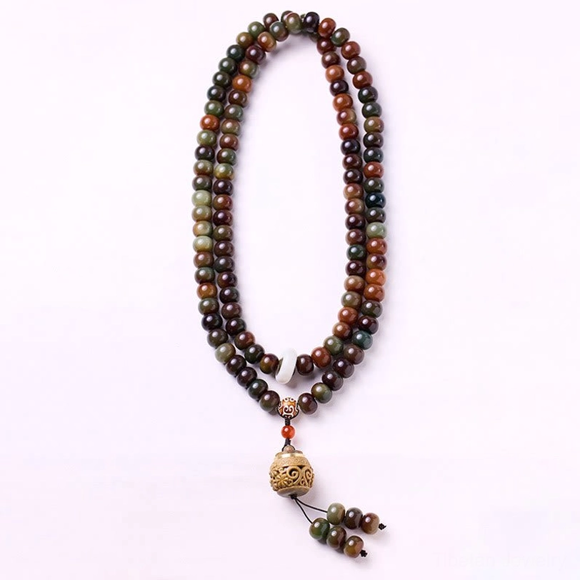 Complete 108-bead Tibetan mala bracelet looped display with carved wooden tassel and small hanging pendant