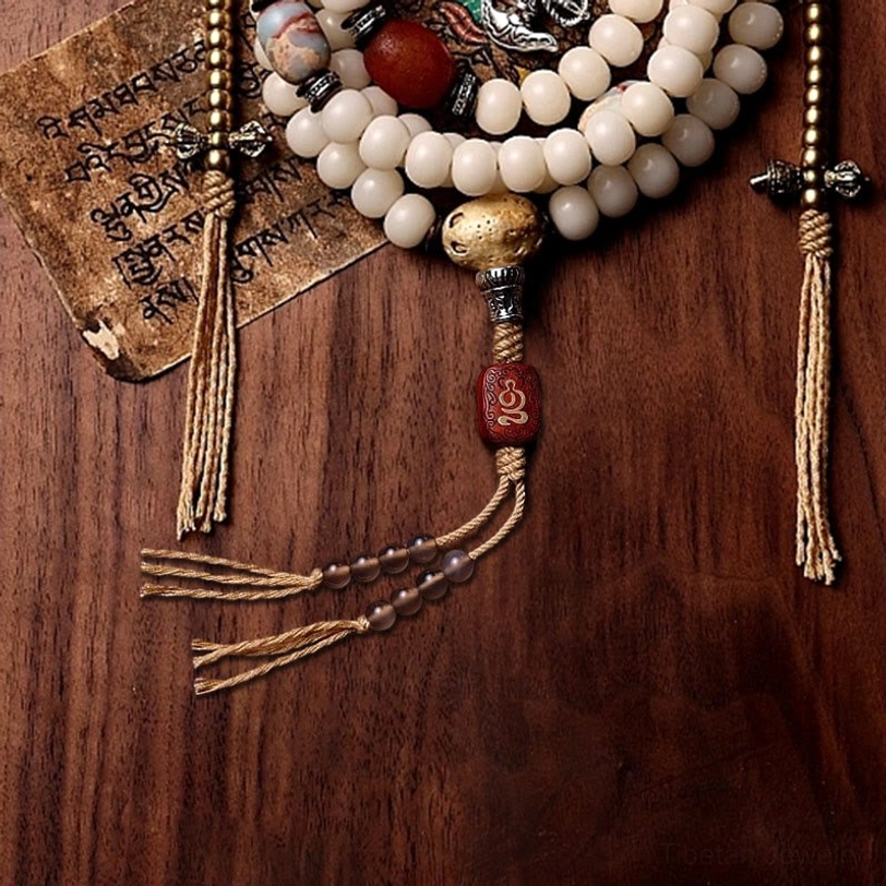 Tibetan 108 mala beads bracelet with hand-painted dzi bead and natural stone materials