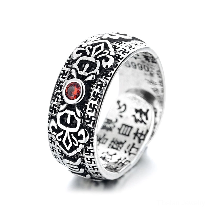 Tibetan open adjustable copper ruby ring 3/4 view featuring clear inner sutra engravings red gem and detailed vintage metalwork