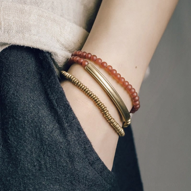 Minimalist Tibetan agate bracelet side view on wrist with natural linen clothing
