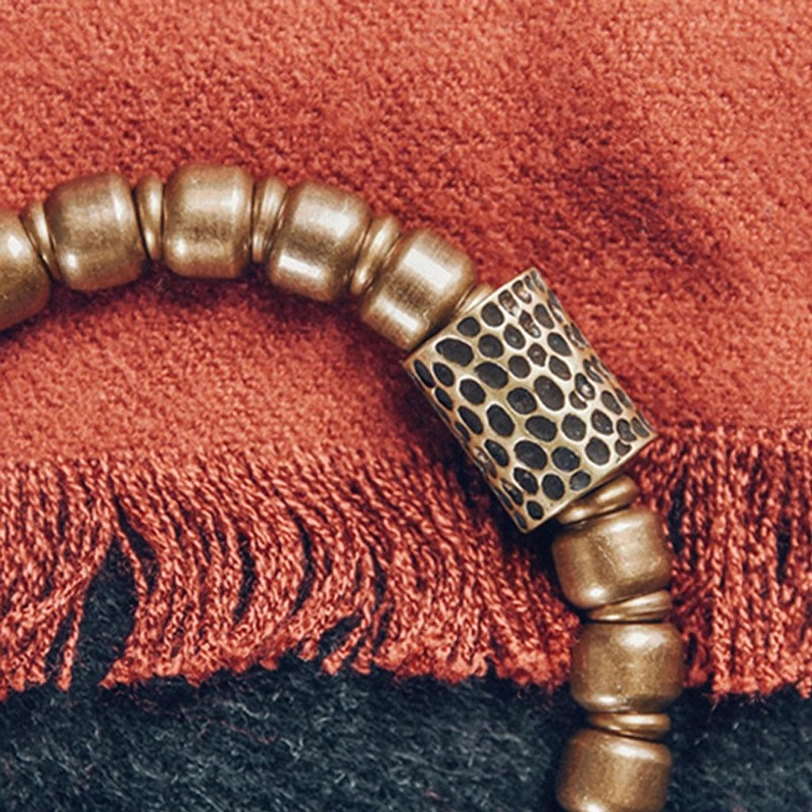 Red agate and green agate Tibetan bracelet collection showing size and style options for men and women