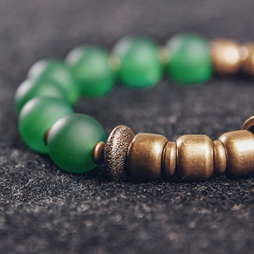 Tibetan agate bracelet with natural stone beads showing authentic color variations and traditional craftsmanship