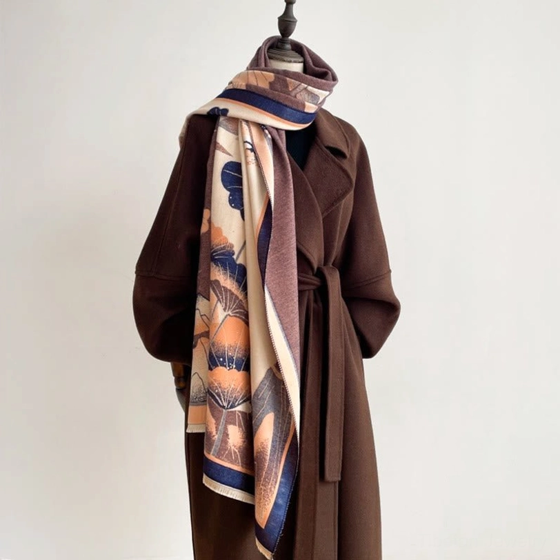 Artisan Tibetan lotus shawl with blue tones and traditional landscape design, wrapped styling on mannequin