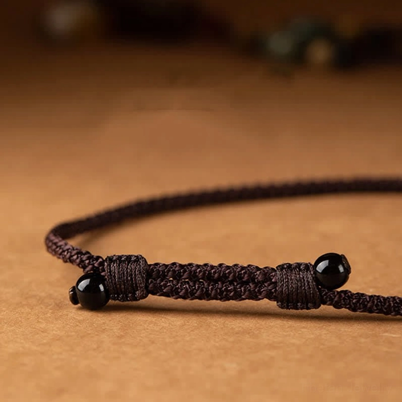 Artisan-made Tibetan Om Mani Padme Hum necklace with healing stone beads and spiritual brass pendant