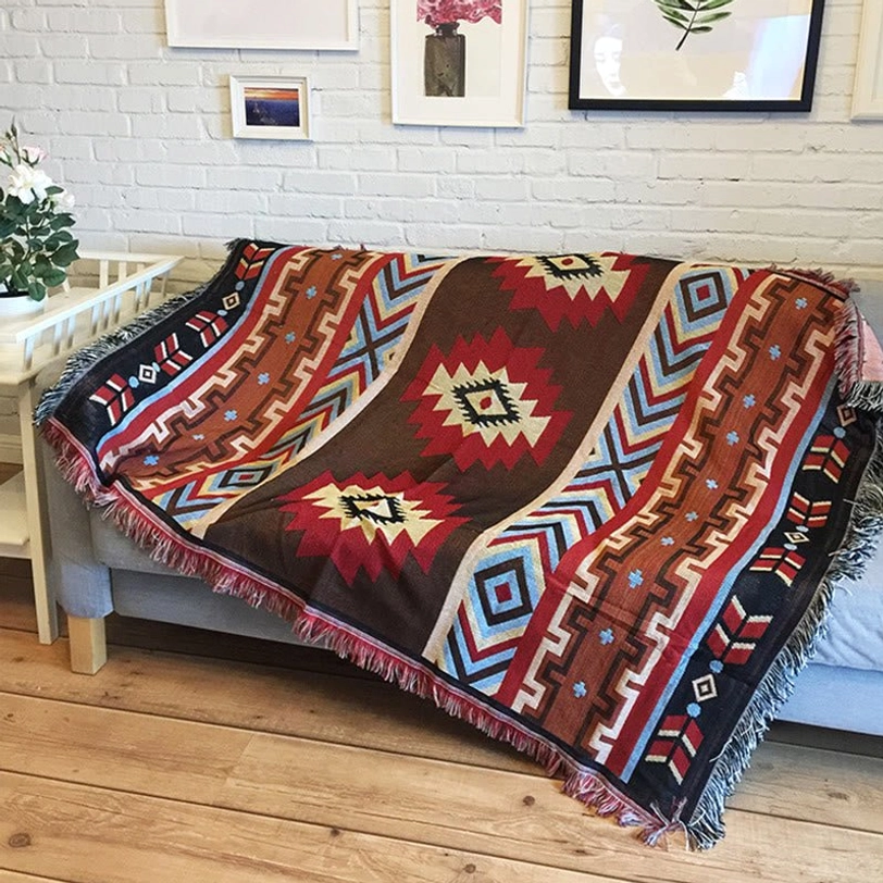 Tibetan geometric blanket showcasing traditional weaving techniques and multi-color yarn selection