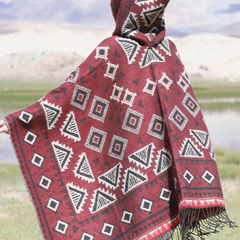 Tibetan poncho cloak with hooded design featuring authentic ethnic geometric tribal motifs and fringe