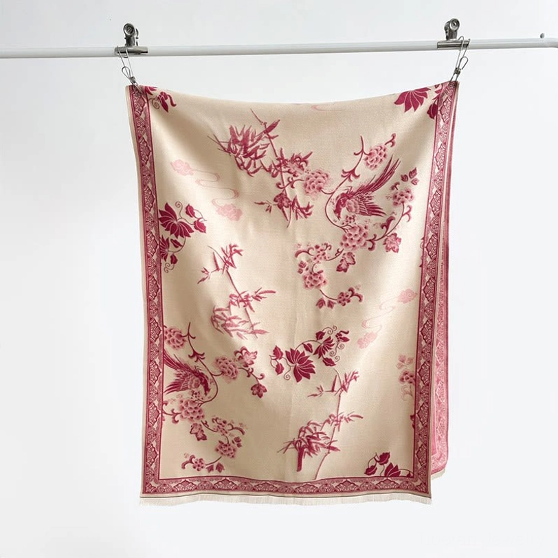 Beige Tibetan scarf with bamboo and bird pattern hanging display
