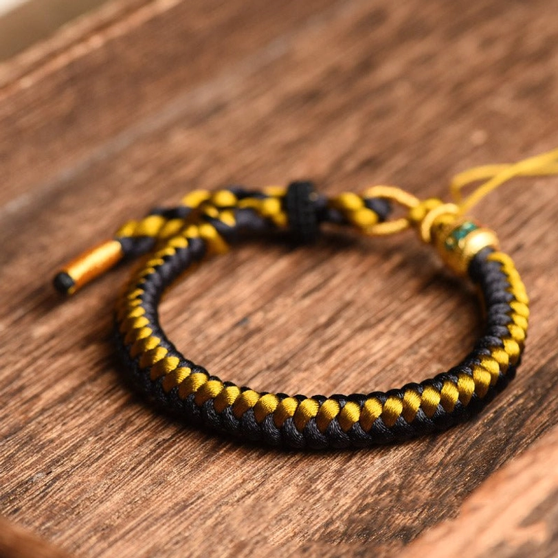 Complete Tibetan dragon scale braided rope bracelet with full weave pattern and adjustable ends
