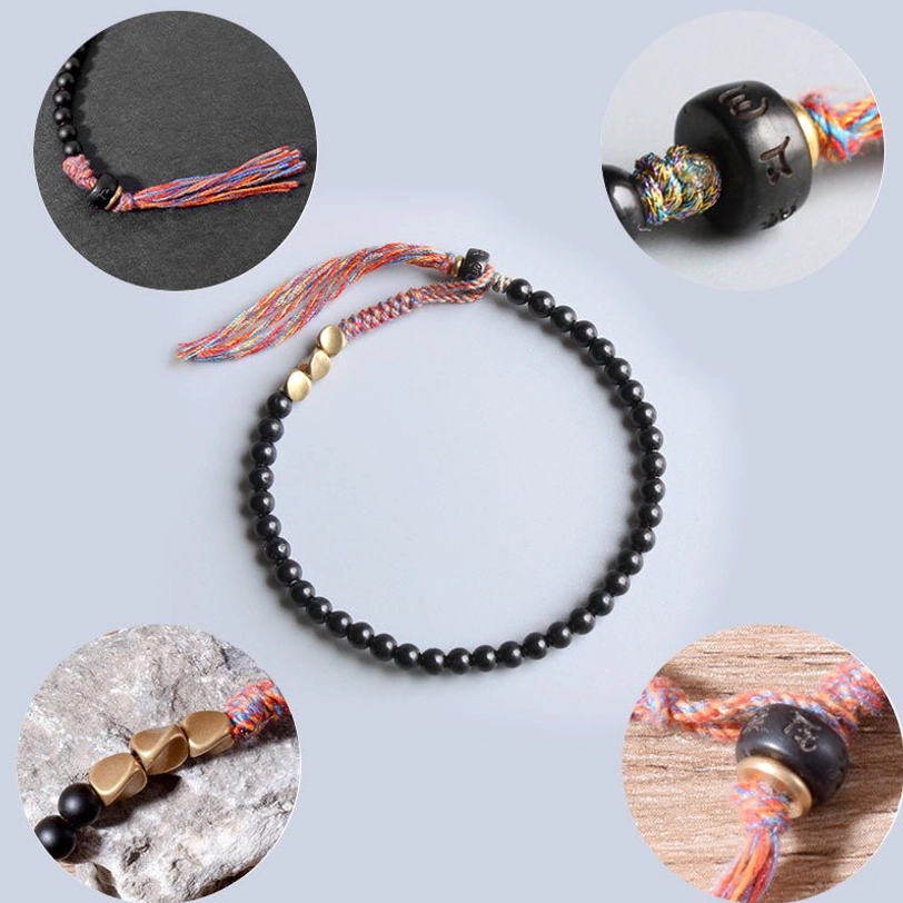 Tibetan black onyx tassel bracelet protection stone for spiritual grounding and chakra balancing - handmade unisex design