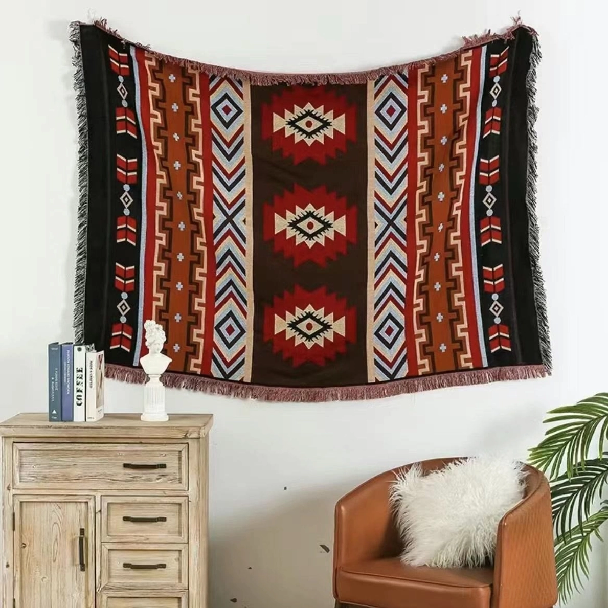 Tibetan geometric throw blanket folded display showing size and thickness natural material construction