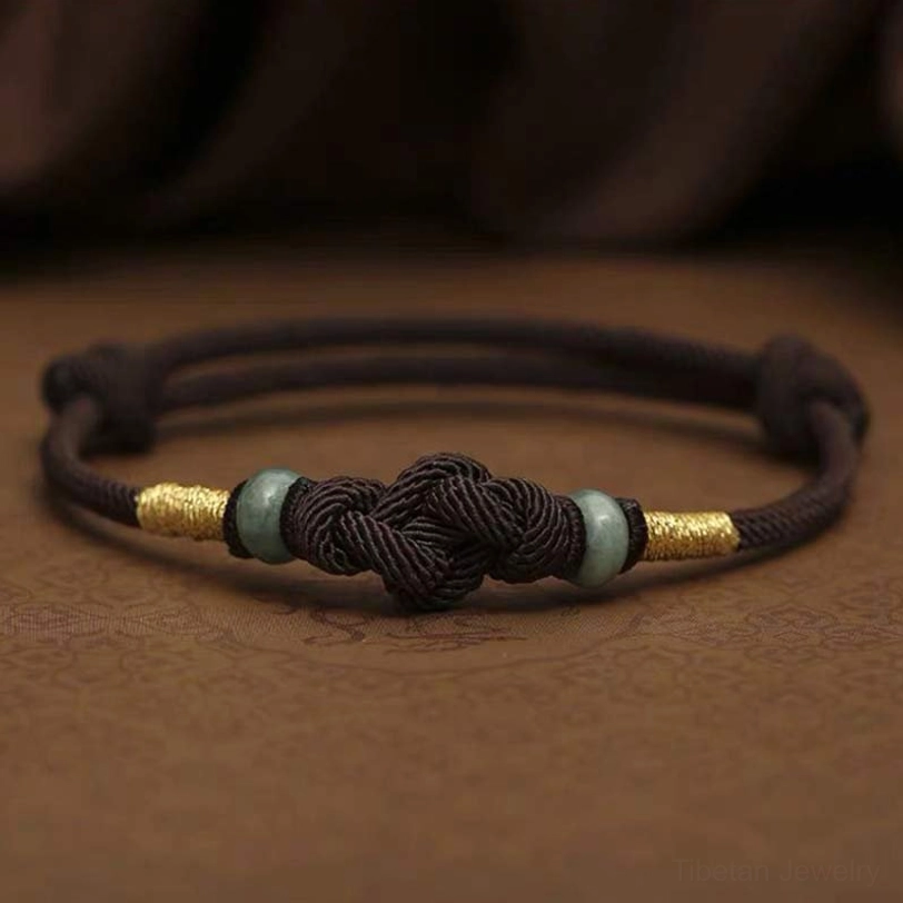 Tibetan blessed red string bracelet with spiritual significance