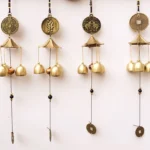 Tibetan blessing wind chimes collection with elephant, bagua, fortune coin, and fu character symbols on white background